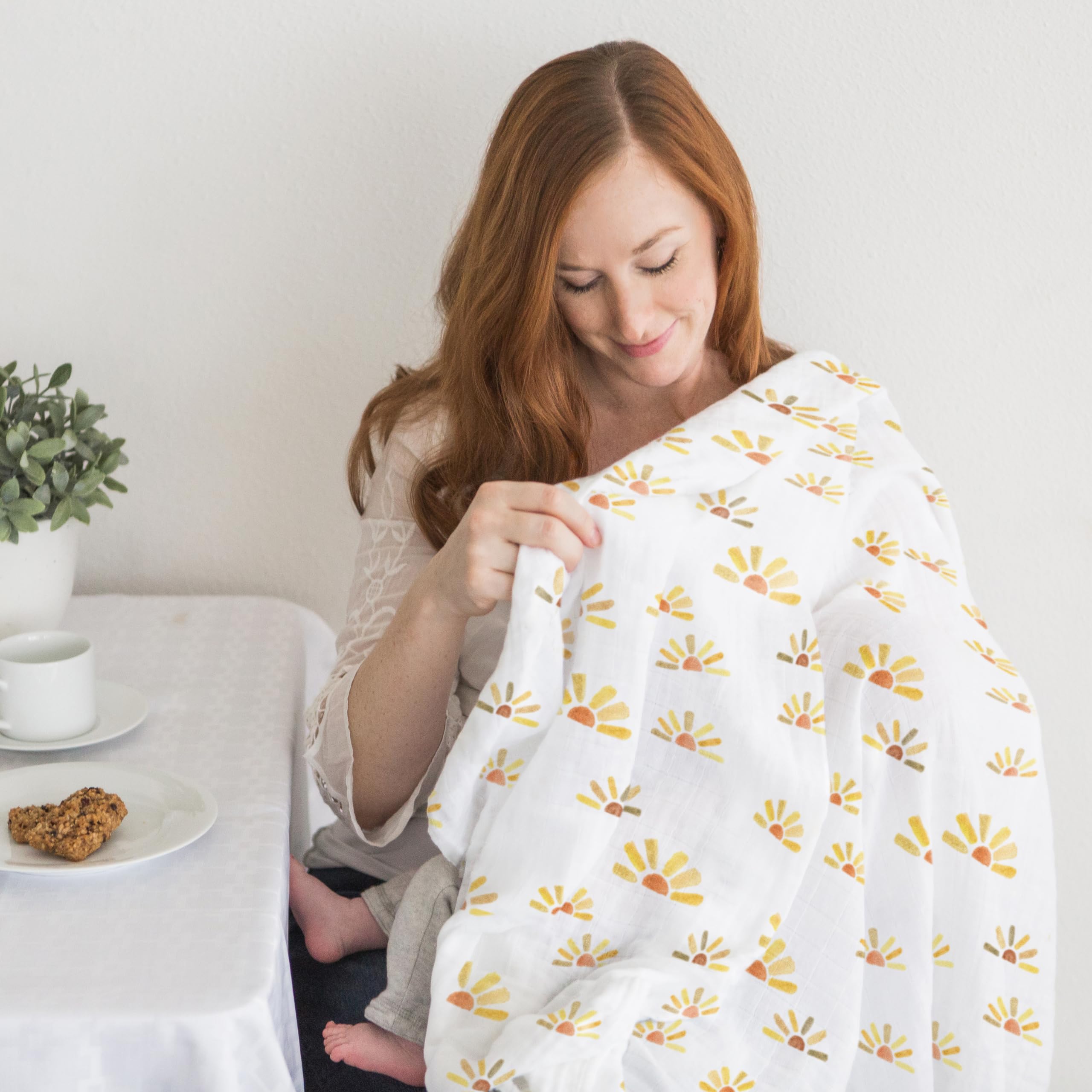 SwaddleDesigns oatmeal machine-washable muslin blanket; easy care for busy families.