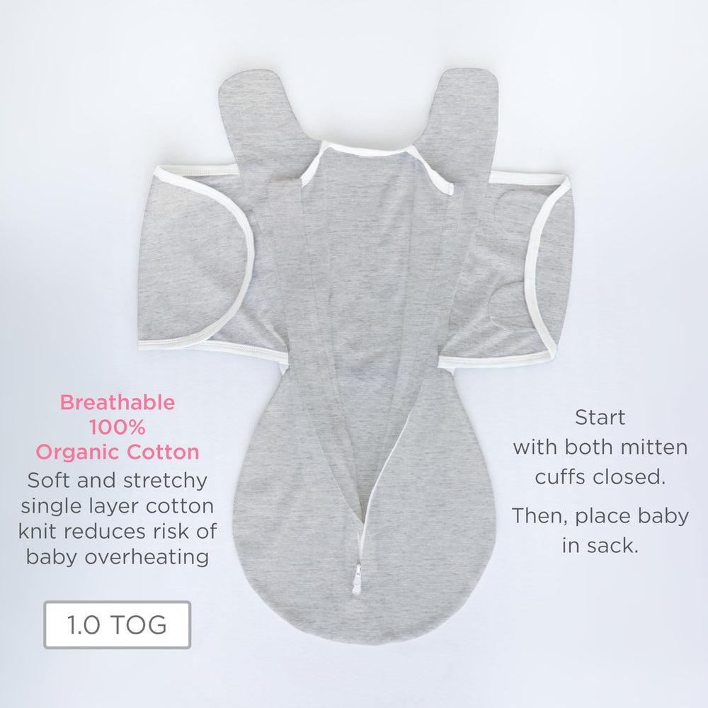 SwaddleDesigns Organic Omni Swaddle 2-Way Zippers enable diaper changes without fully waking baby.