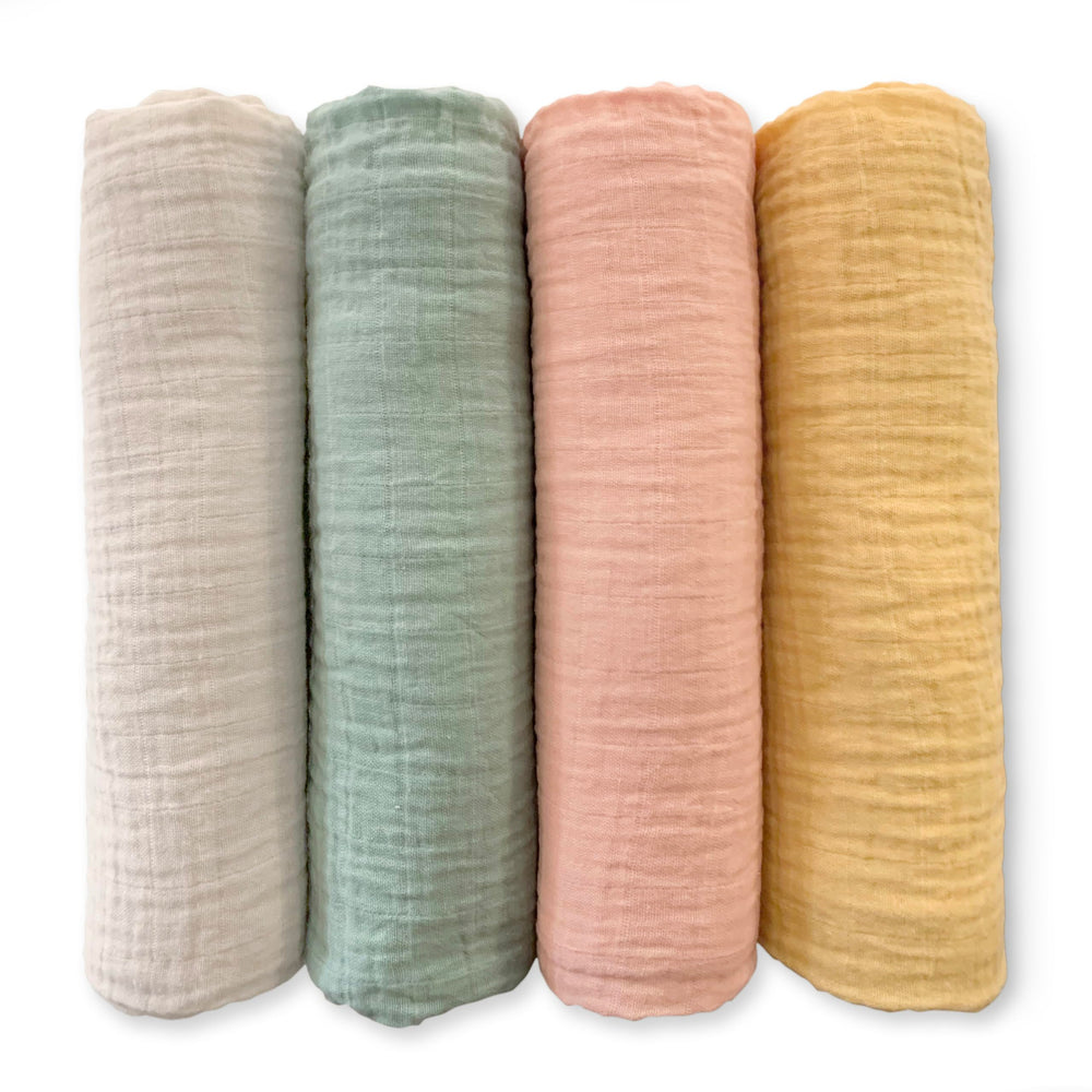 SwaddleDesigns Spring Garden muslin blanket 4-pack for breathable newborn swaddling.