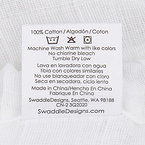 SwaddleDesigns elastic-bottom sheet keeps standard crib mattresses snug