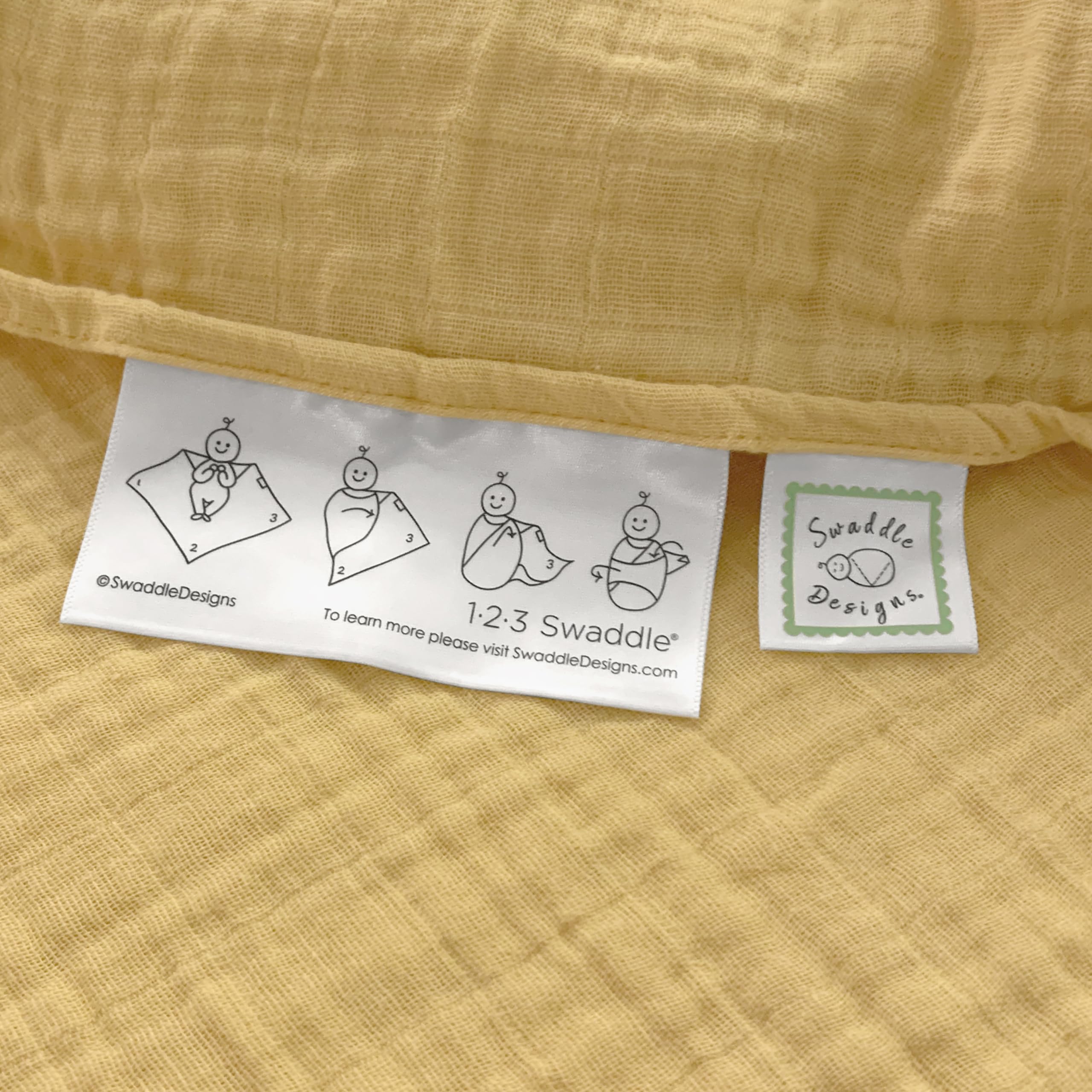 SwaddleDesigns sunshield-stroller image, lightweight muslin shades baby on outings.