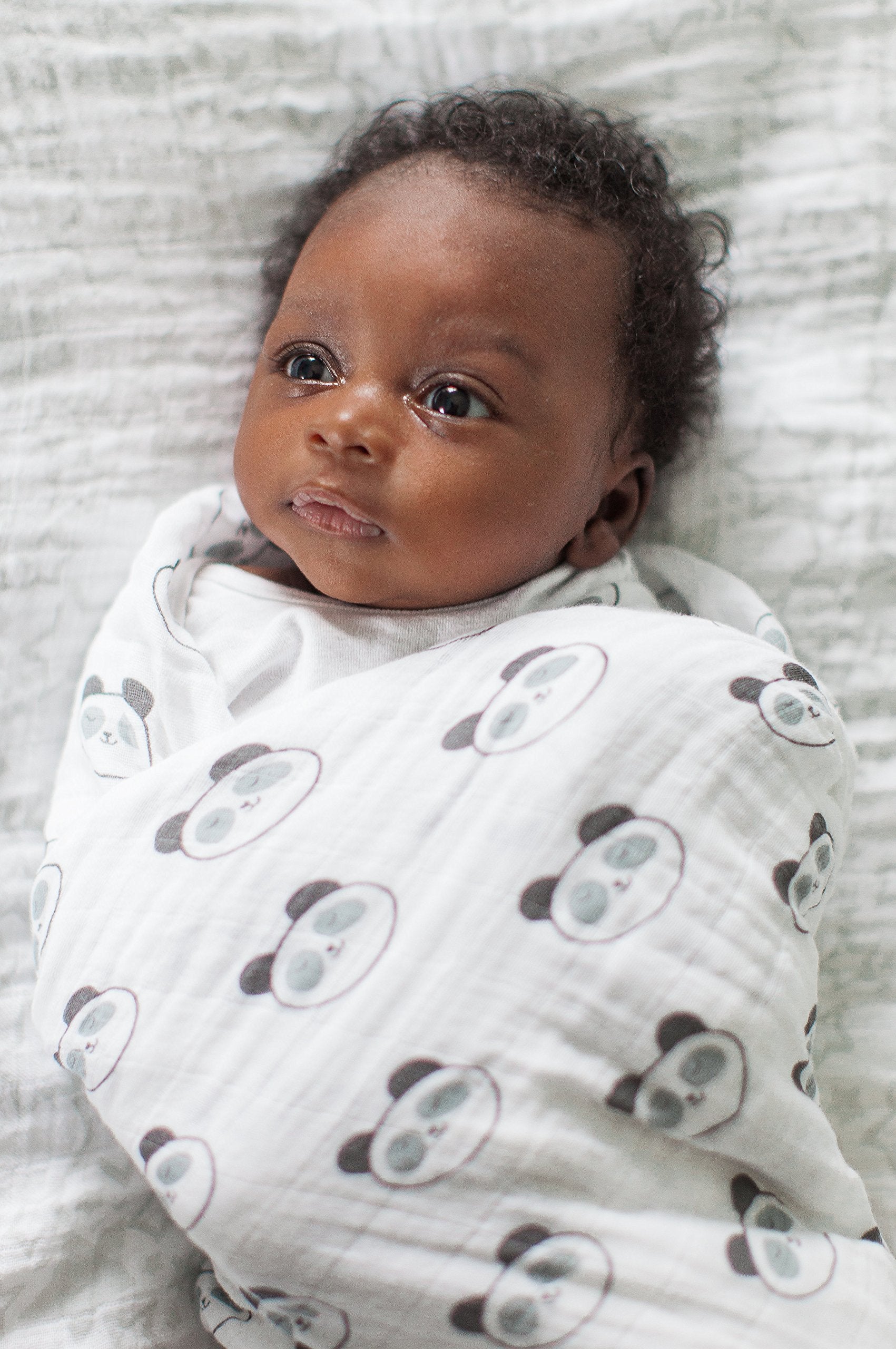 SwaddleDesigns swaddle label with easy steps for confident swaddling