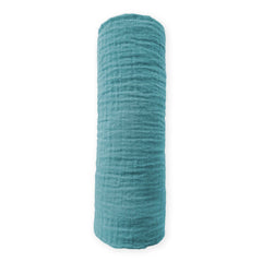 SwaddleDesigns teal cotton muslin blanket folded to show soft texture and premium color