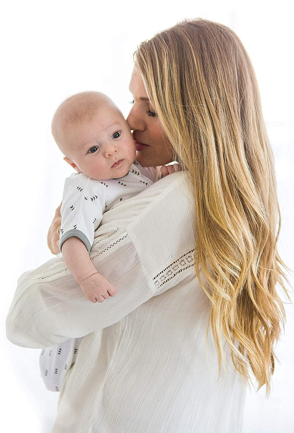 SwaddleDesigns wearable blanket in use offers transitional sleepwear comfort.
