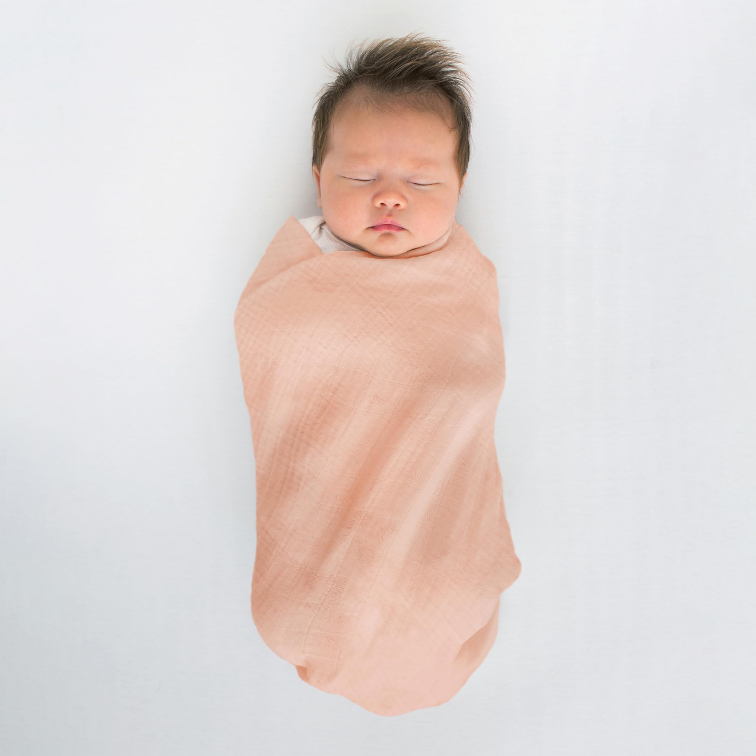 SwaddleDesigns versatile blanket used as sunshield and nursing cover.