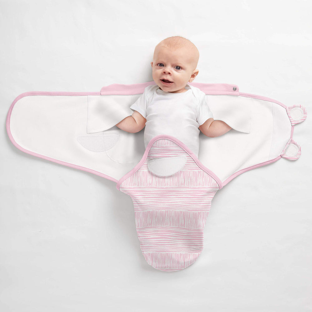 SwaddleMe arms-by-side traditional swaddle offers secure comfort and calm.