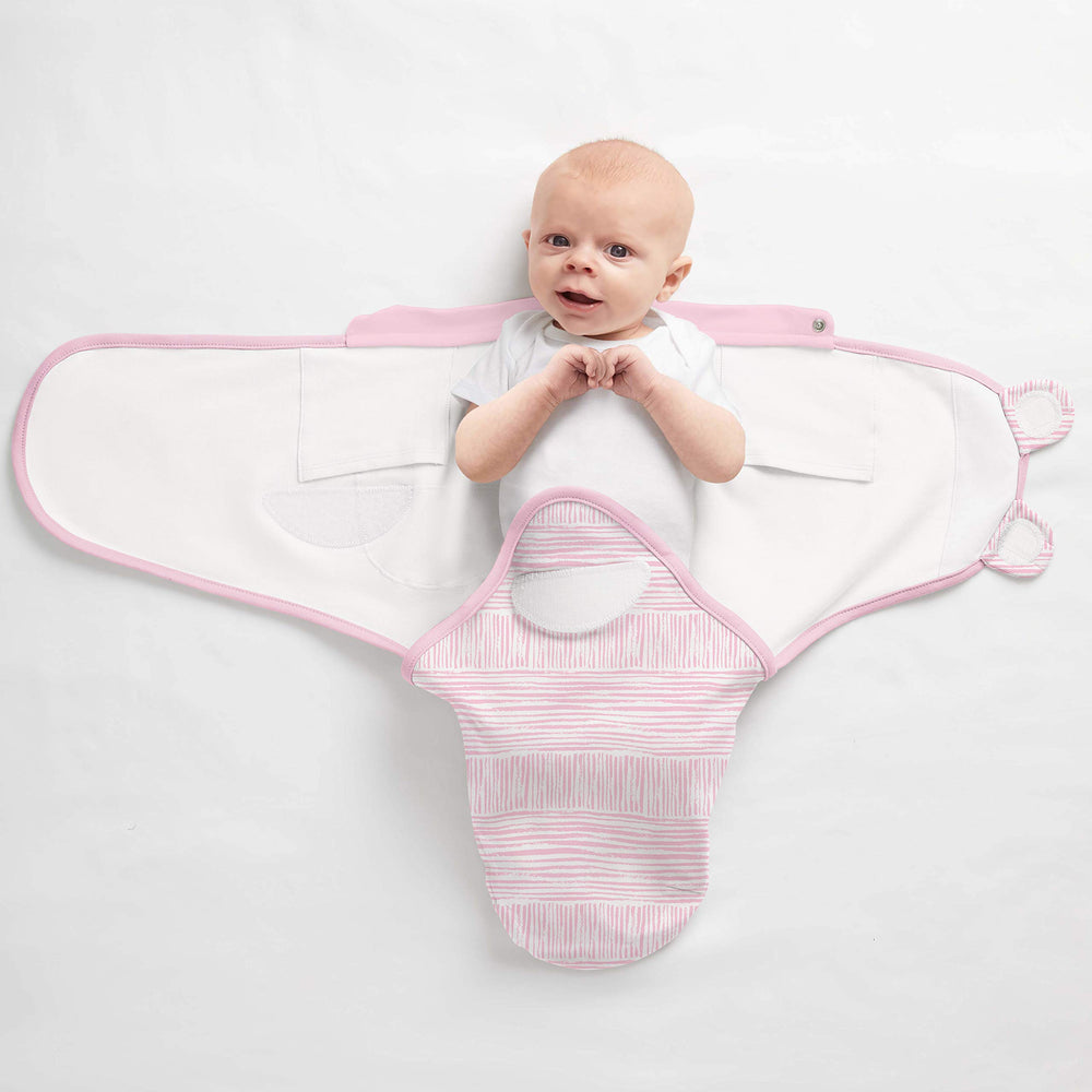 SwaddleMe arms-over-chest position for a cozy, womb-like feeling.