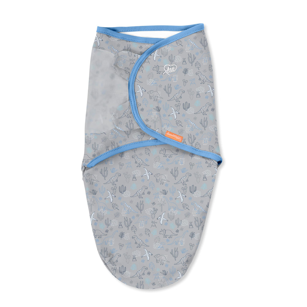 SwaddleMe Dino Time hip healthy design supports natural movement.