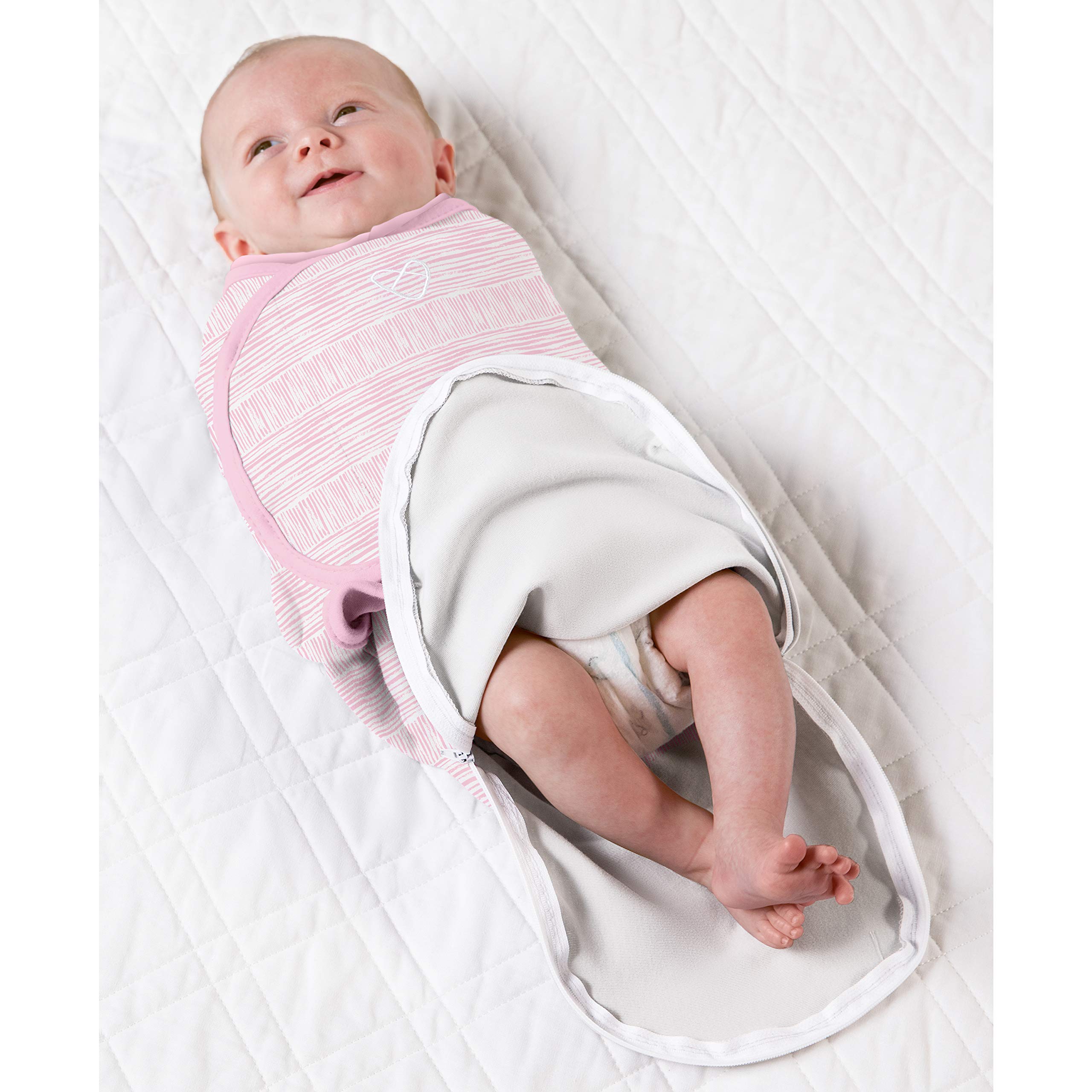 SwaddleMe secure wings with hook-and-loop adjust the fit precisely.