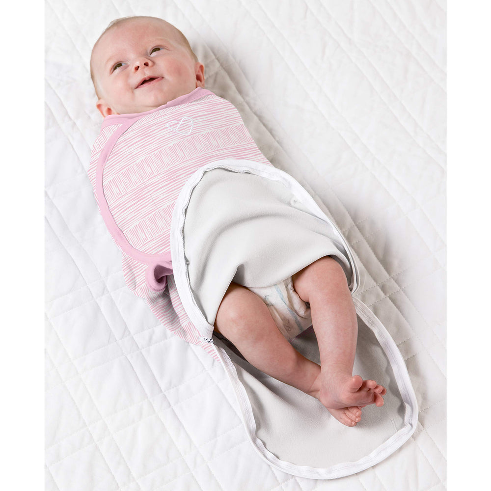 SwaddleMe secure wings with hook-and-loop adjust the fit precisely.