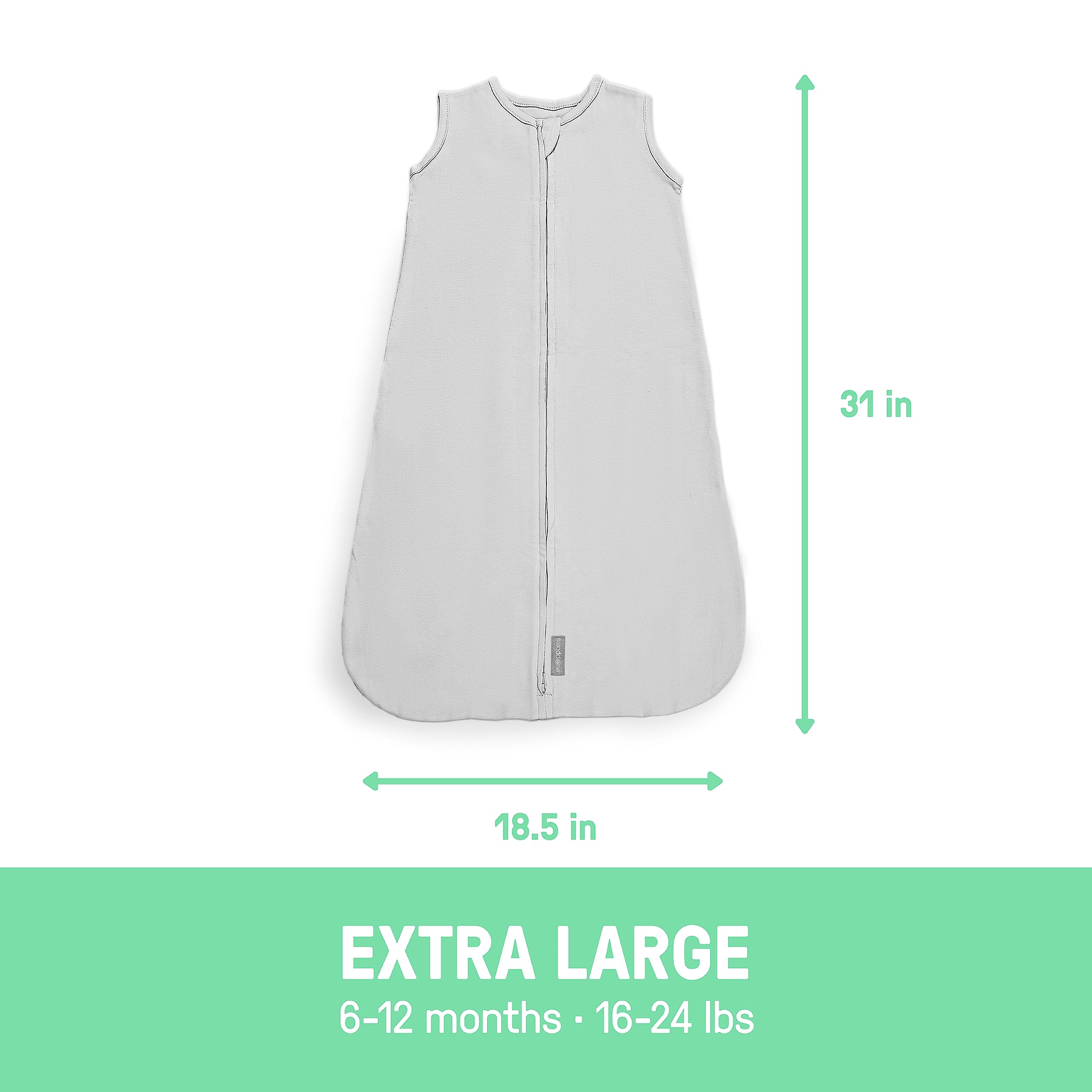 SwaddleMe Night Sack Sleeper layered with pajamas for cozy comfort.
