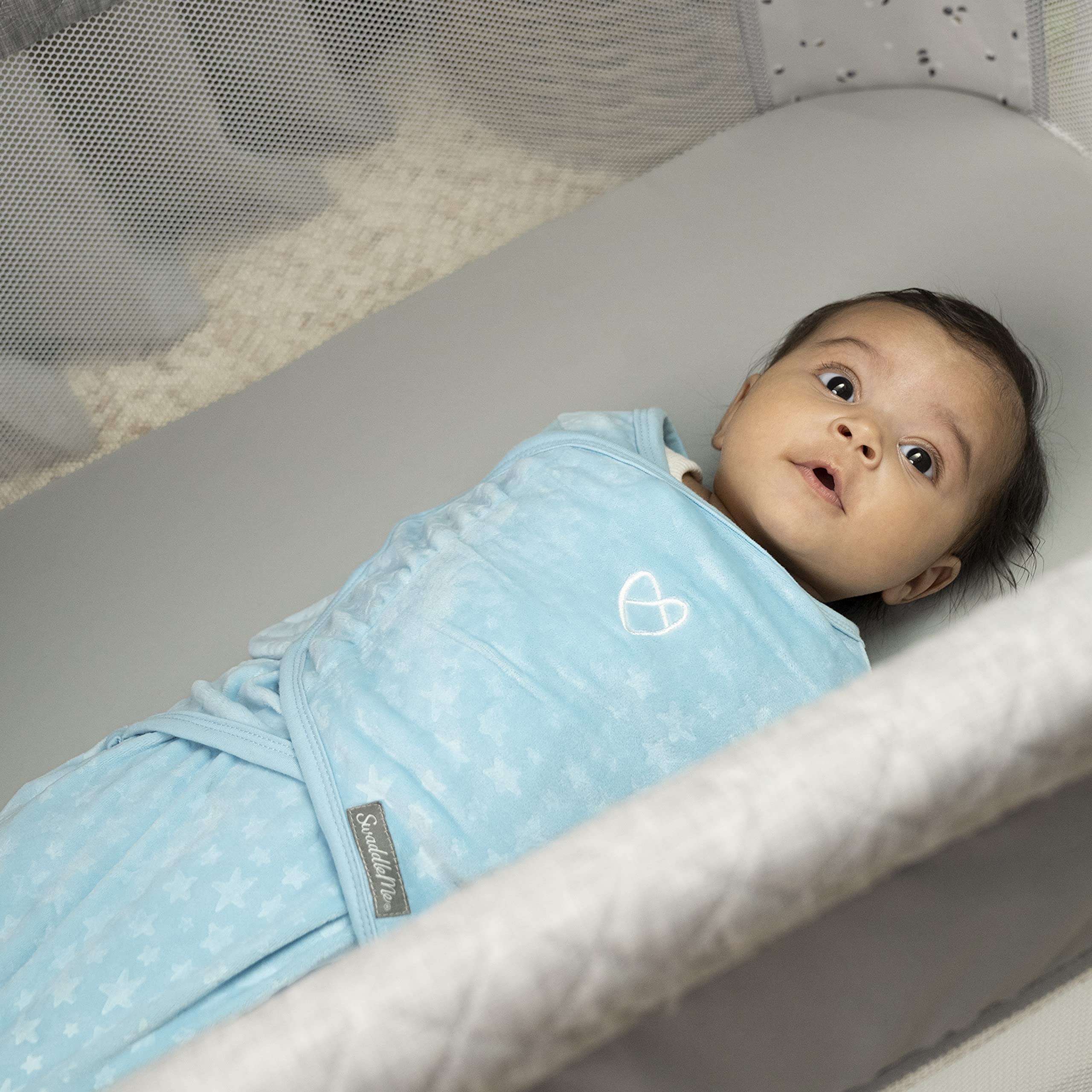 SwaddleMe Original Swaddle Small/Medium baby-wrapped image highlights womb-like snug fit.