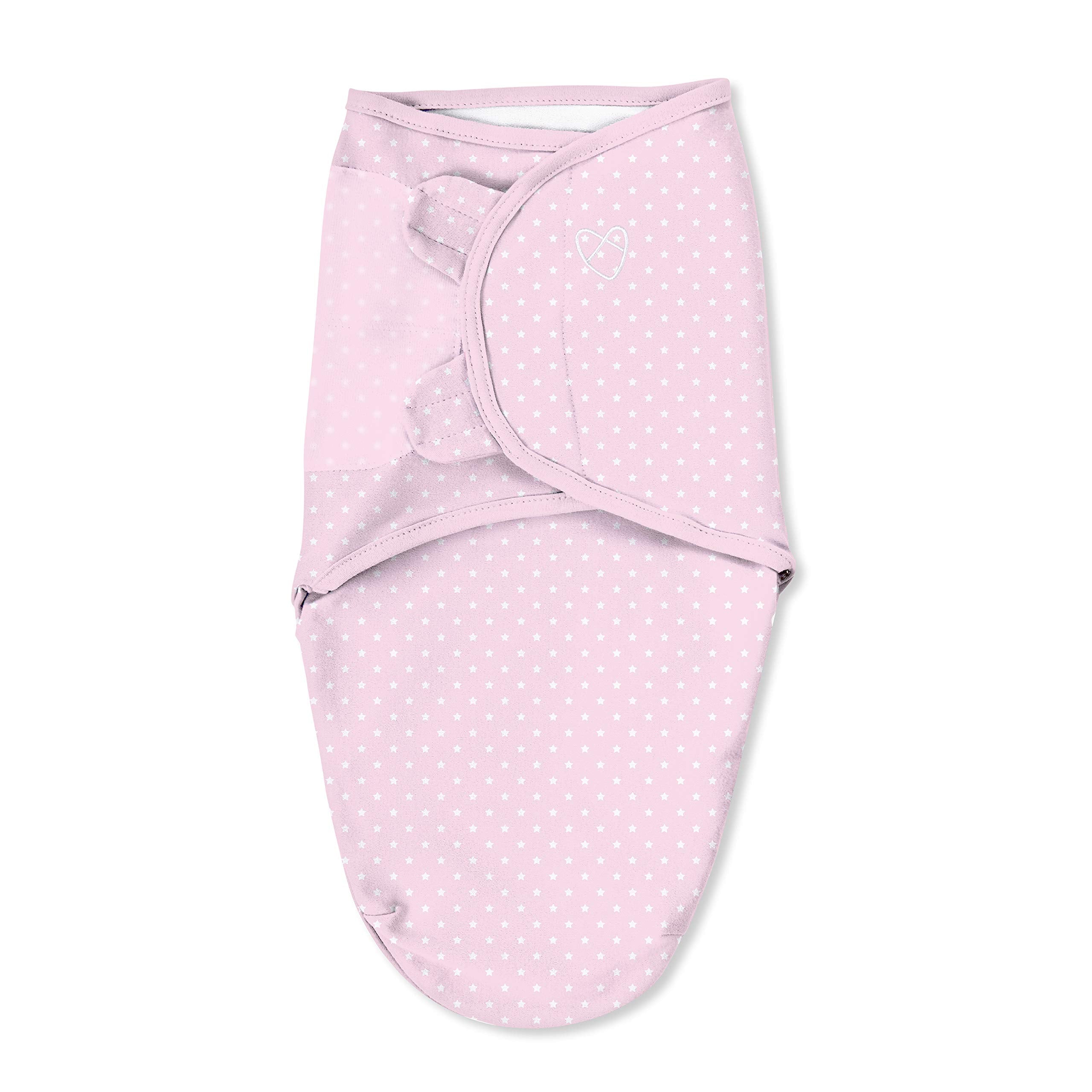 SwaddleMe: small pink polka whale, closure close-up showing secure hook-and-loop fit.