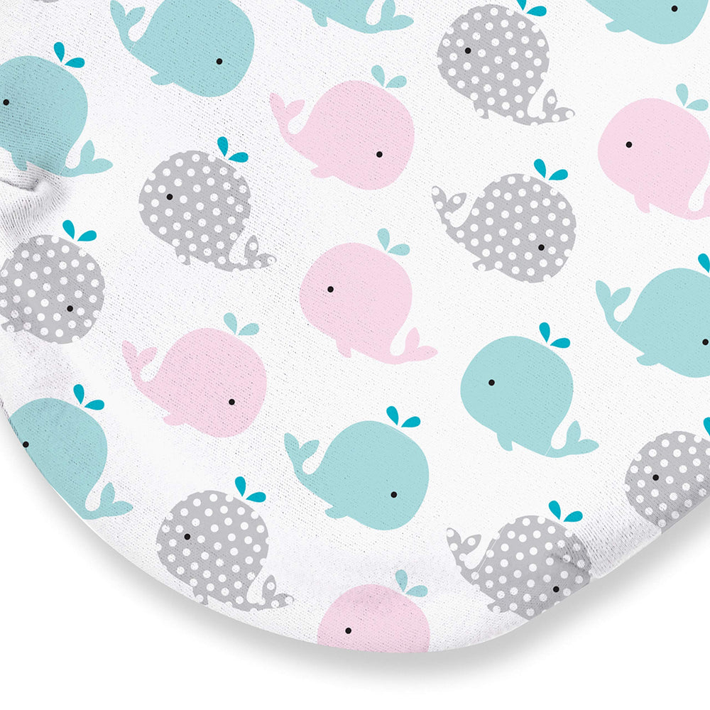SwaddleMe Original Swaddle small pink polka whale wrapped softly around baby.