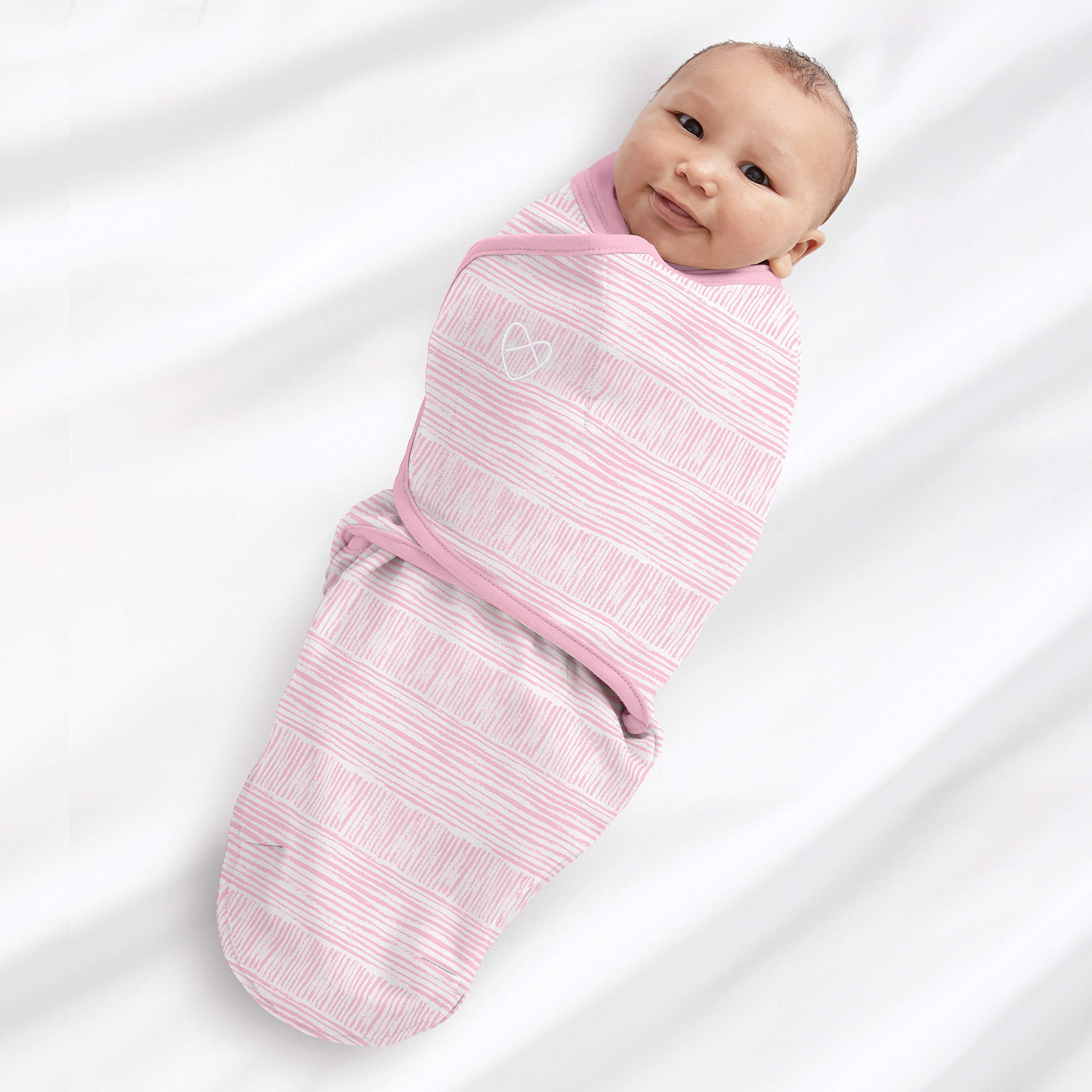 SwaddleMe size small/medium fits 0–3 months, 7–14 lbs, up to 26 inches.