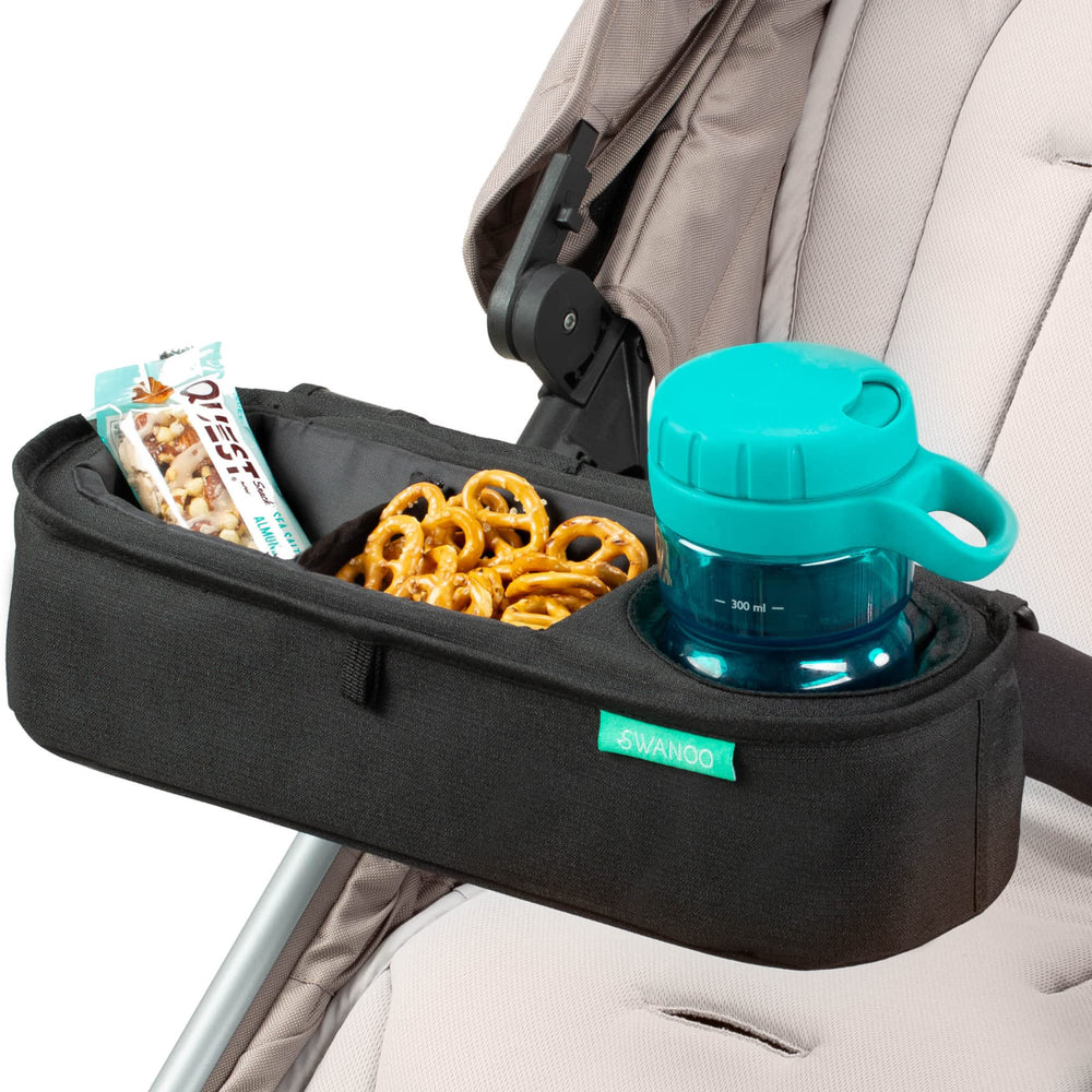 Swanoo universal stroller tray showing secure non-slip straps on a stroller bar.
