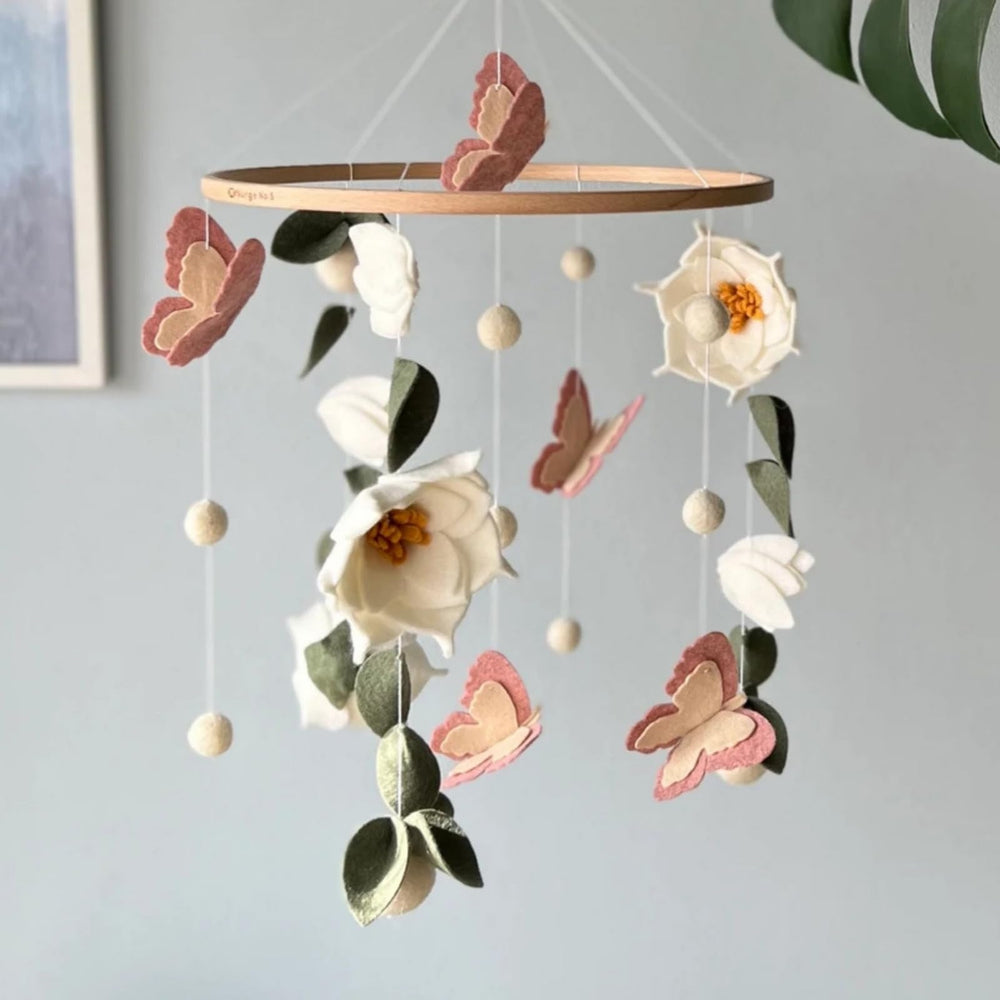 SWECOMZE boho-style mobile complements unisex cribs with neutral, stylish vibes.