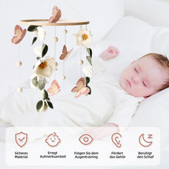 SWECOMZE floral mobile over the crib provides gentle movement for a soothing visual centerpiece.