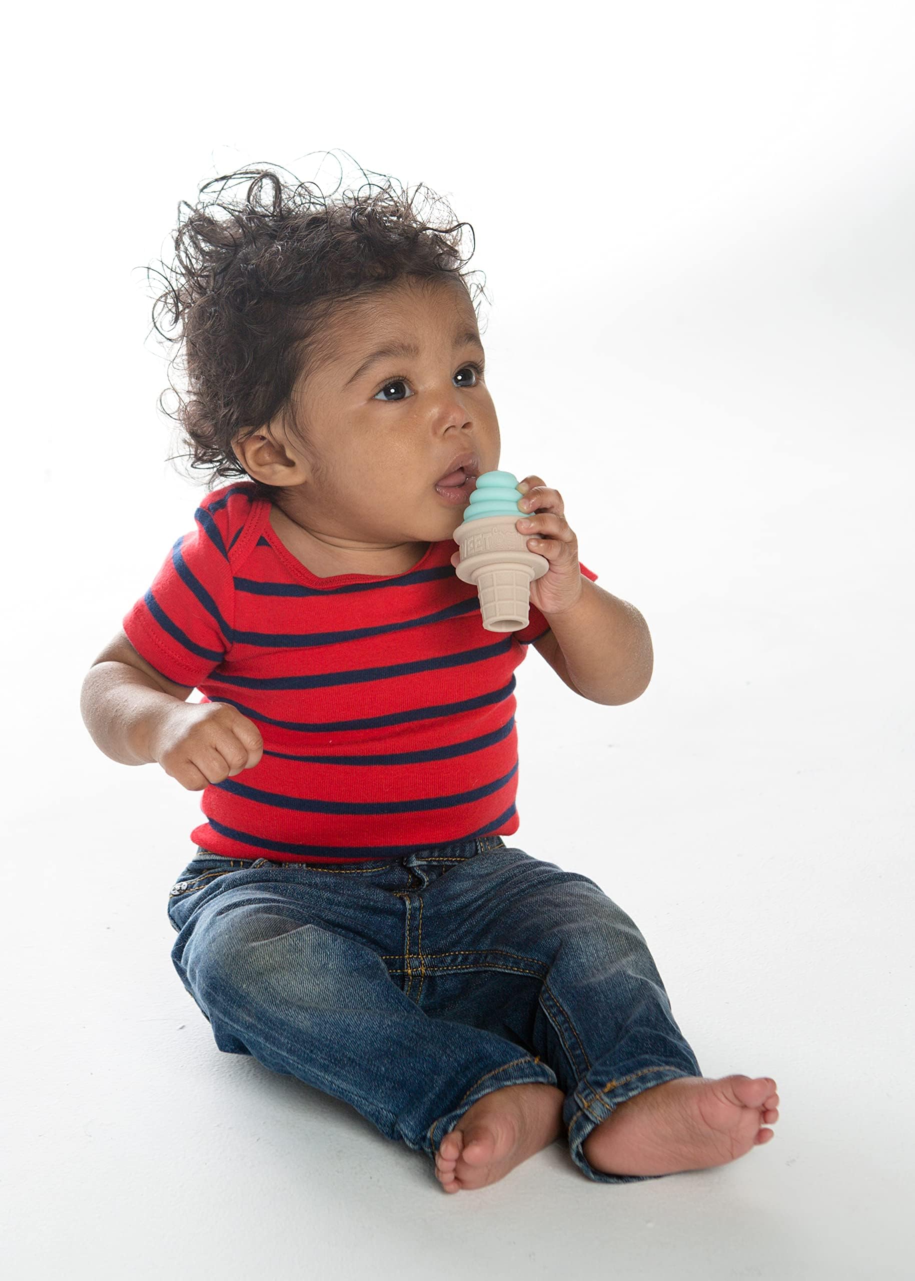 SweeTooth teether shown in freezer, ready for cooling sore gums.