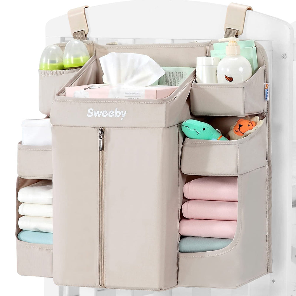 Sweeby diaper organizer hangs on changing table with easy diaper access