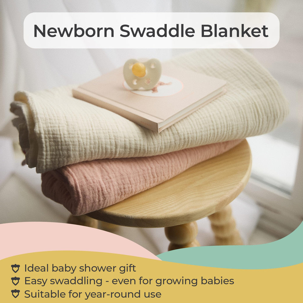 Sweet Acorn swaddle blanket shown on a stroller for on-the-go comfort.