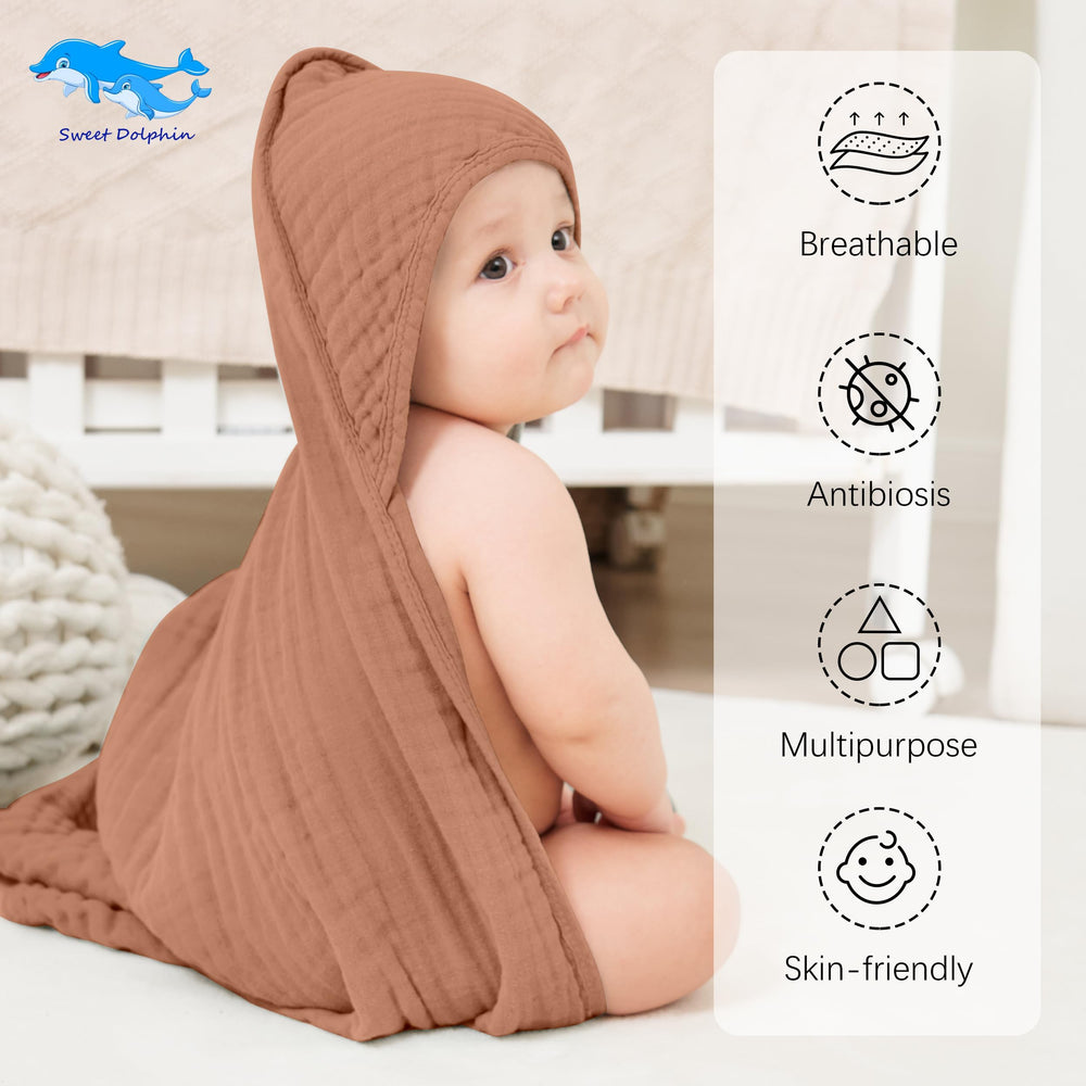 Sweet Dolphin muslin towel absorbent cotton for quick drying and skin comfort.