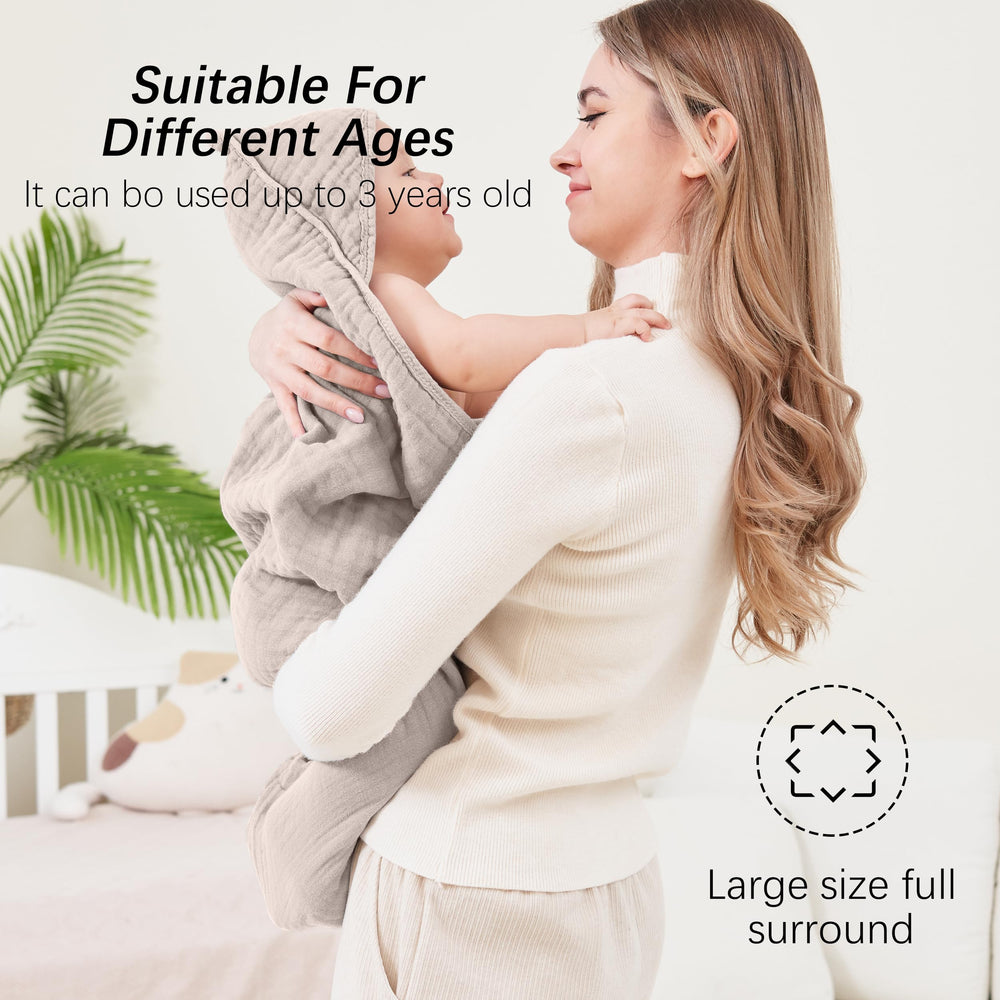 Sweet Dolphin muslin towel in soft colors soothing bath time for baby.