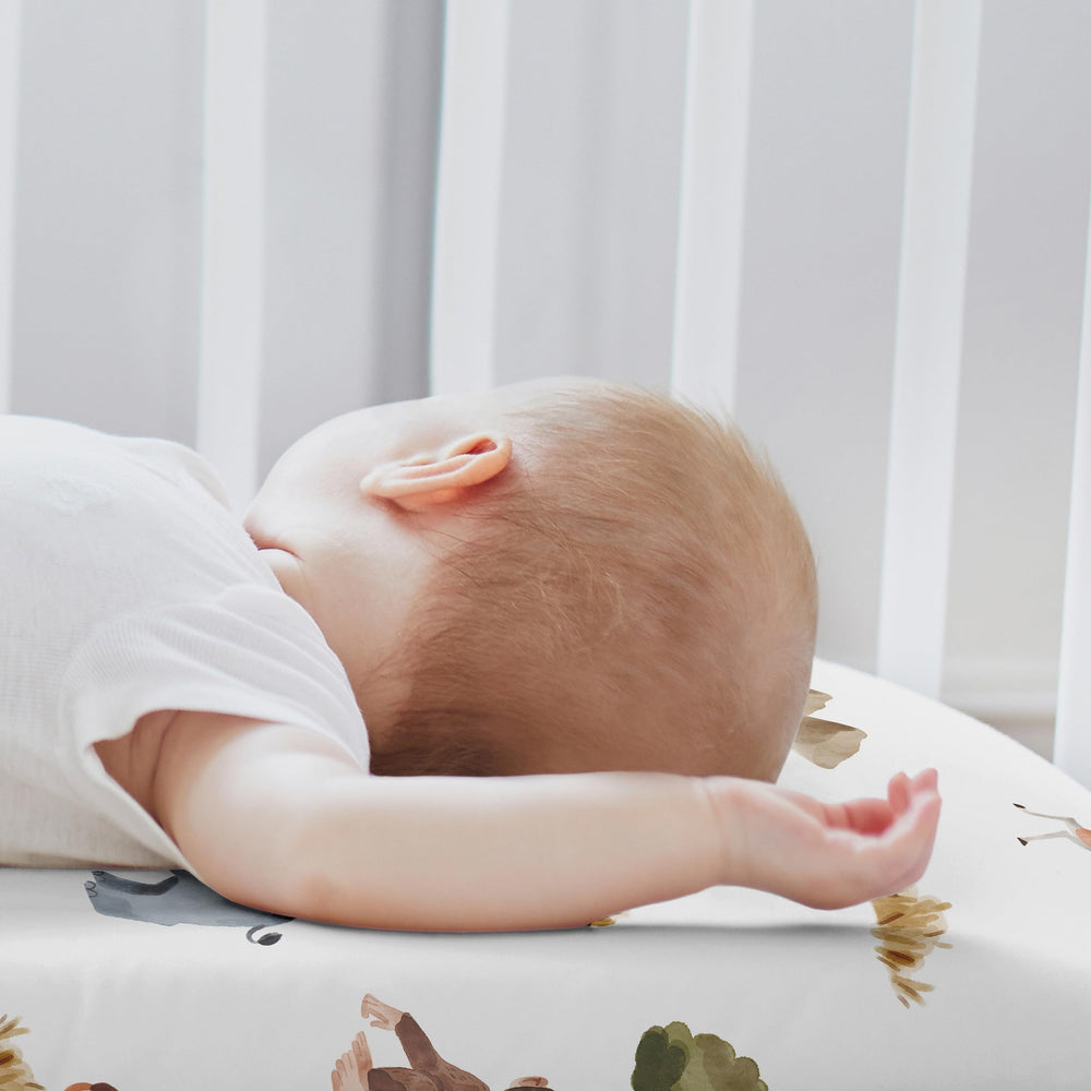 Sweet Jojo Designs bassinet sheet showing elastic edge for secure fit