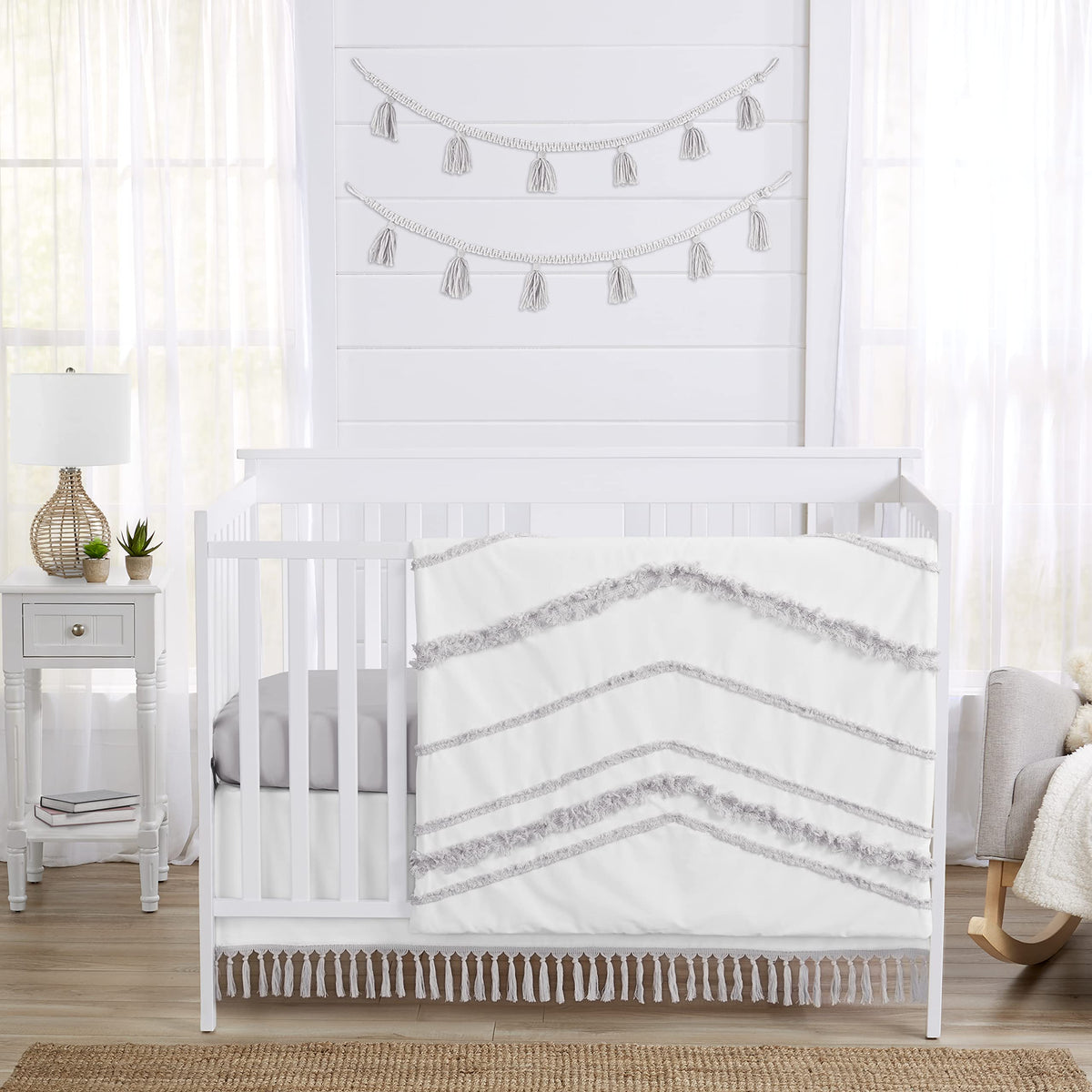 Sweet Jojo Designs boho 4-piece crib bedding with fringe for a cozy nursery.