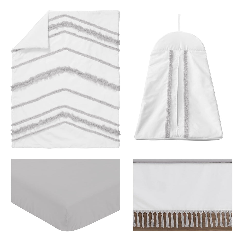 Sweet Jojo Designs crib blanket with tassel fringe offers soft warmth for naps.