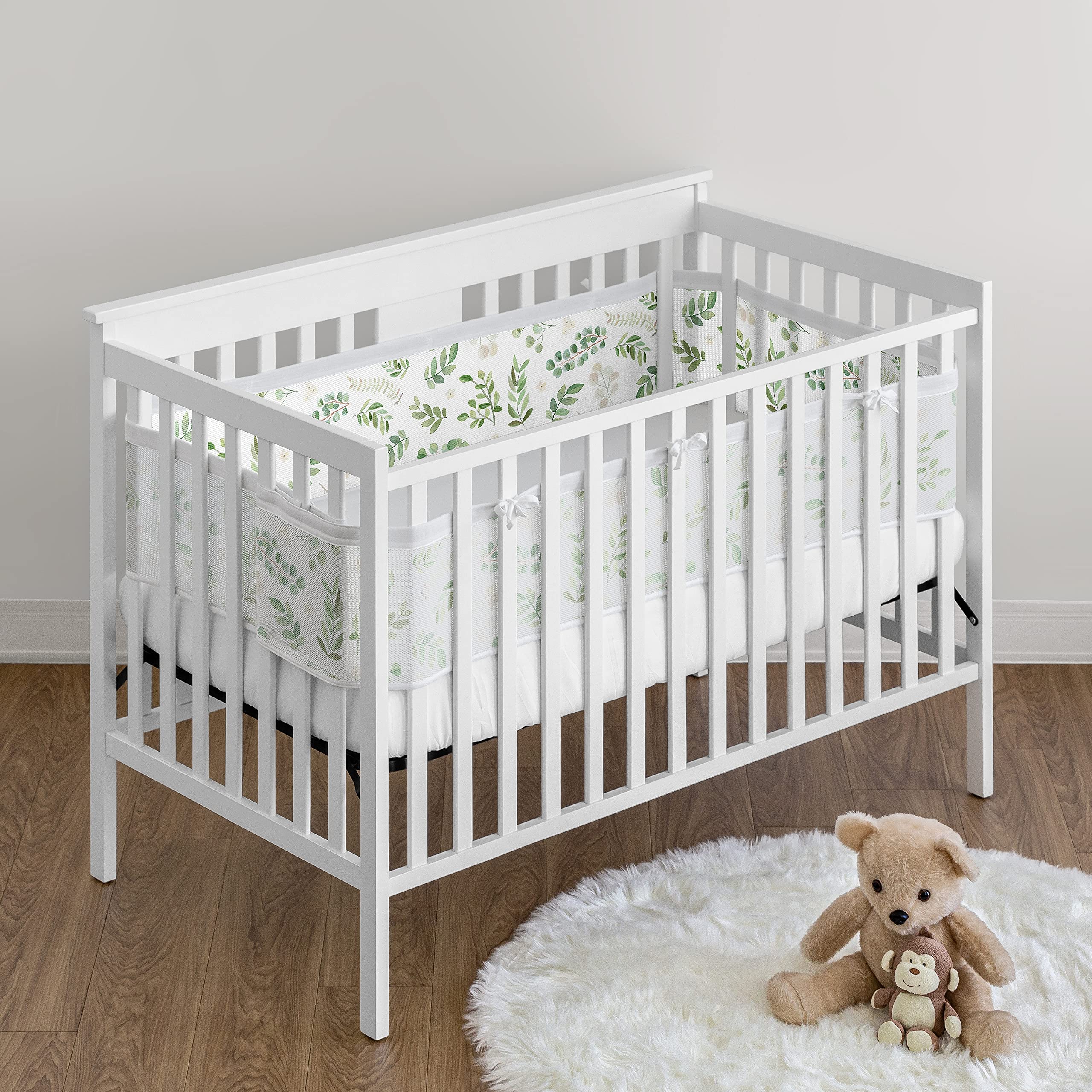 Sweet Jojo Designs bohemian watercolor crib liner complements nursery decor with soft pattern.