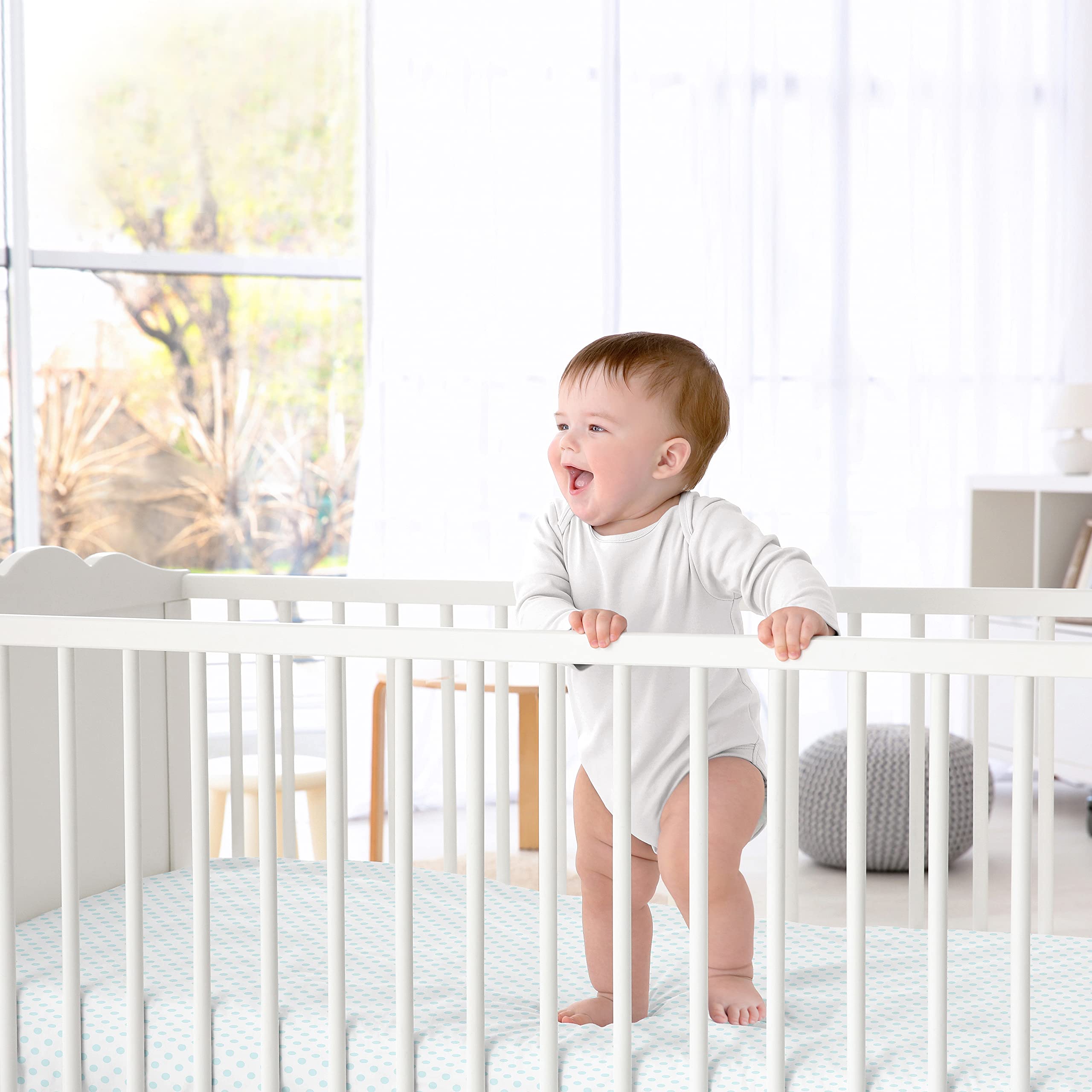 Sweet Jojo Designs brushed microfiber crib sheet feels soft and comfortable for baby sleep.
