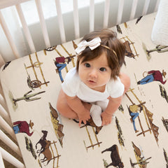 Sweet Jojo Designs cow print crib sheet with durable easy-care fabric