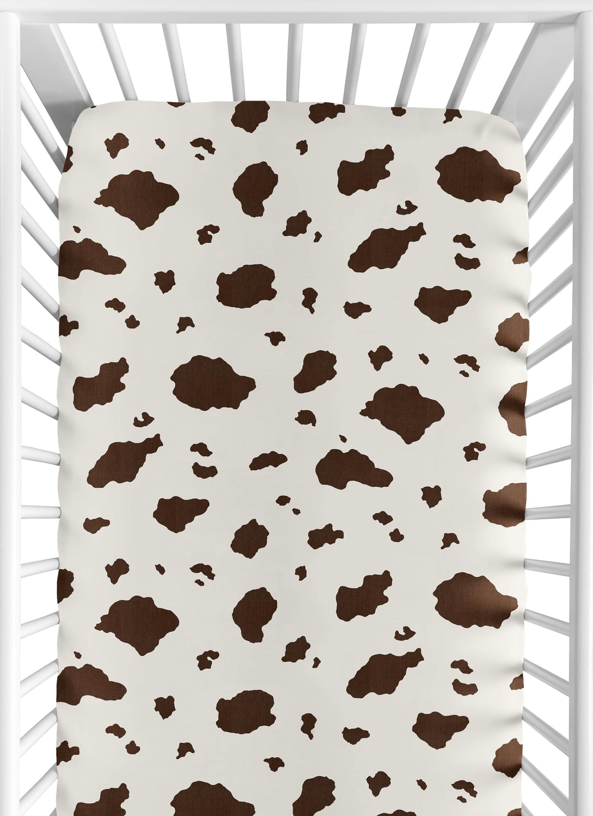 Sweet Jojo Designs cow print crib sheet close-up in soft brushed microfiber for cozy sleep.