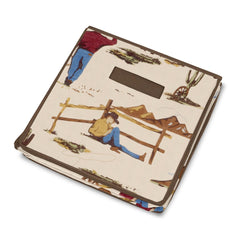 Sweet Jojo Designs Cowboy Wild West print detail enhances nursery decor.