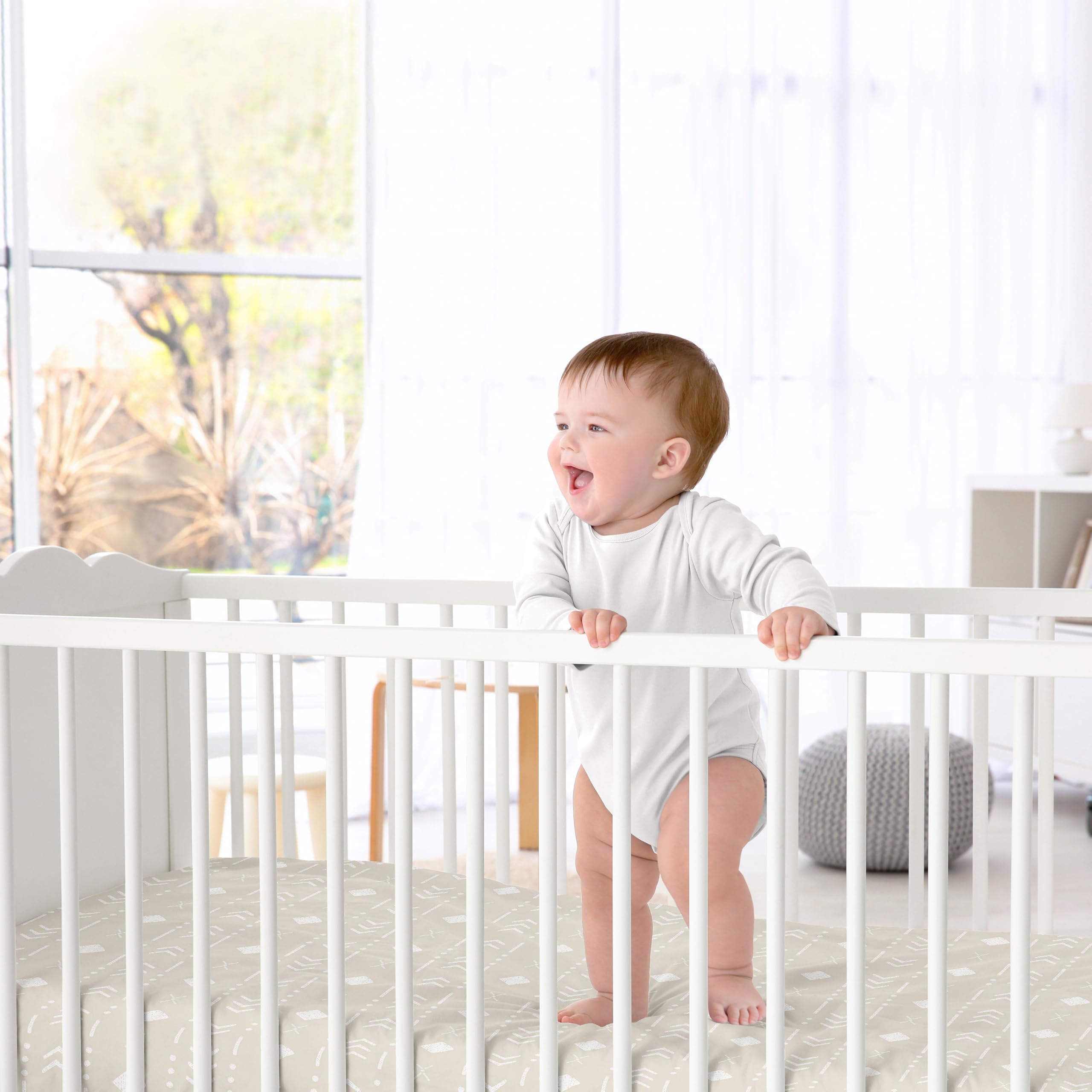 Sweet Jojo Designs crib sheet with elastic bottom for a secure fit on standard cribs.