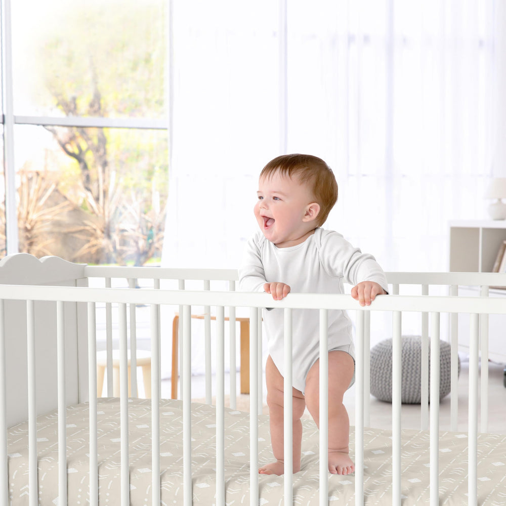 Sweet Jojo Designs crib sheet with elastic bottom for a secure fit on standard cribs.