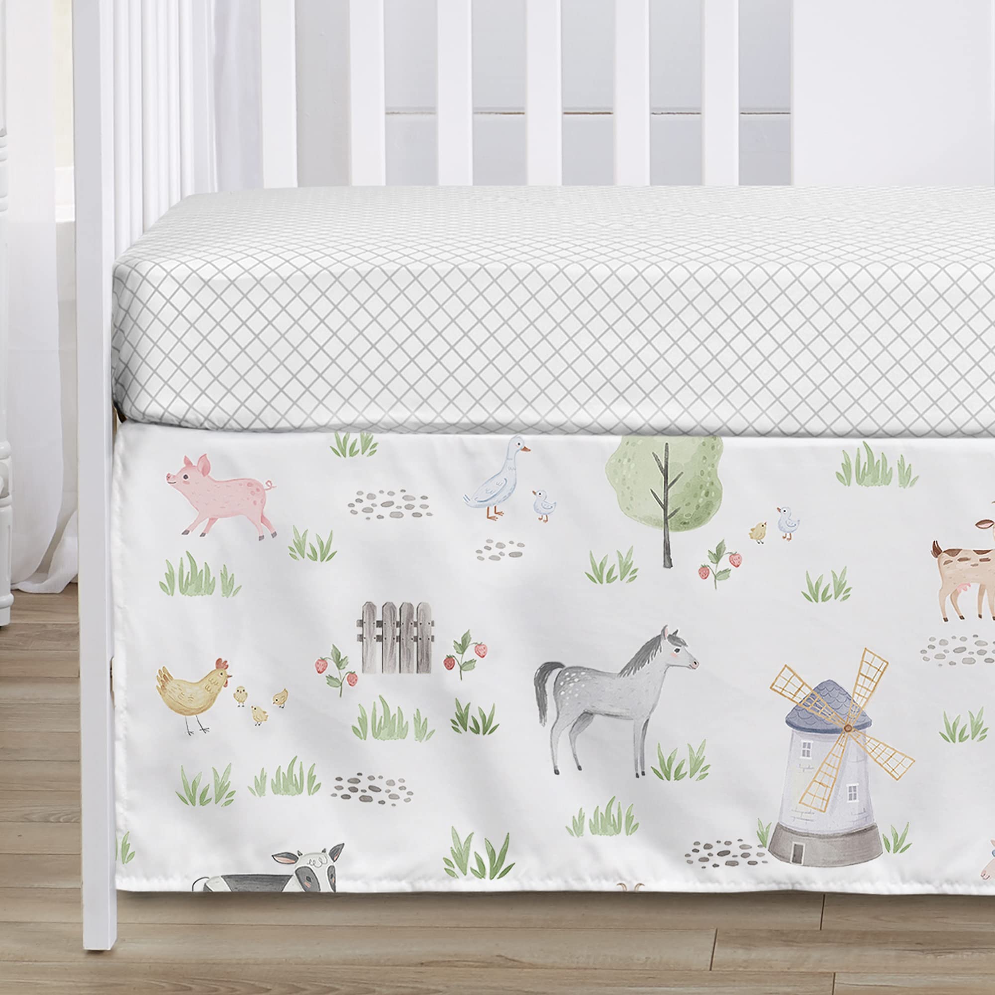 Sweet Jojo Designs diaper stacker keeps baby essentials organized within reach.