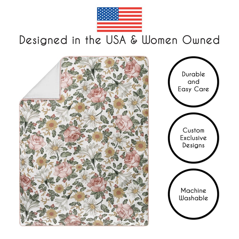 Sweet Jojo Designs diaper stacker keeps nappies organized and within easy reach.
