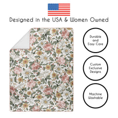 Sweet Jojo Designs diaper stacker keeps nappies organized and within easy reach.