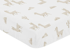 Elastic bottom edge demonstrated on a Sweet Jojo Designs crib sheet