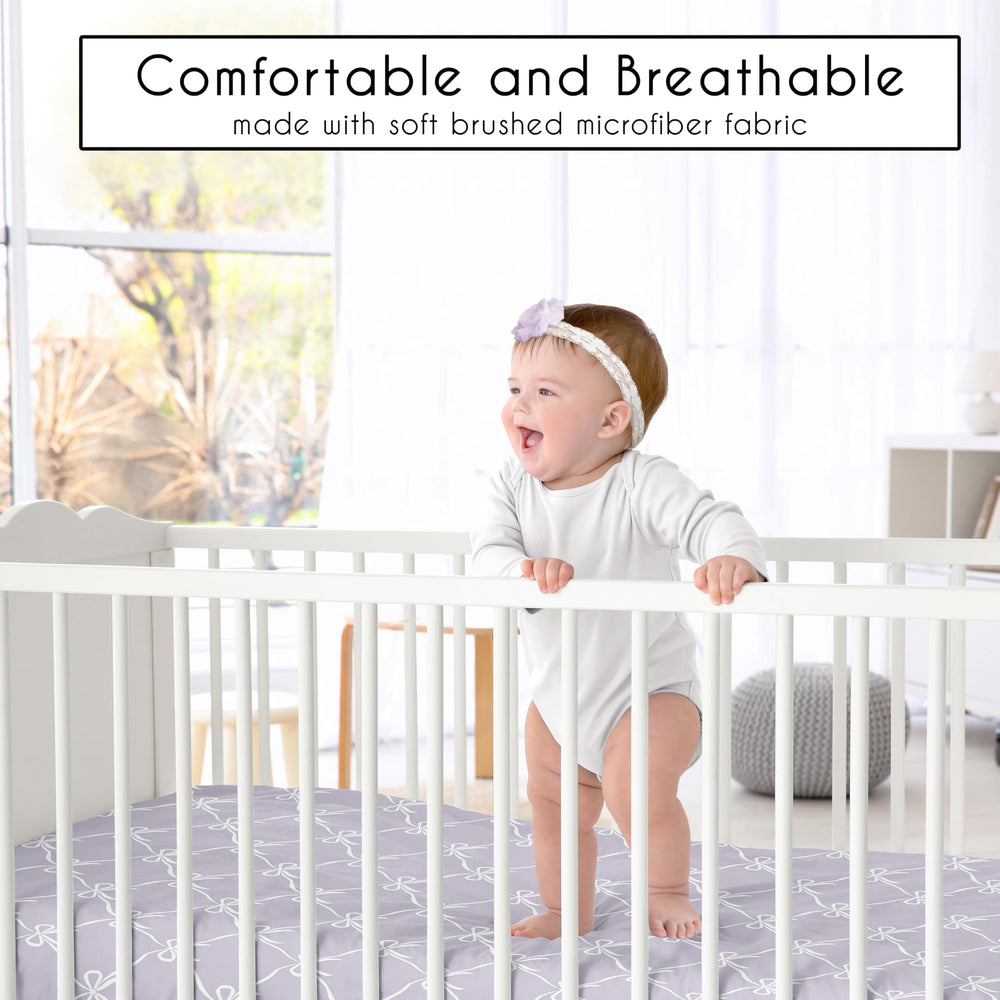 Sweet Jojo Designs elastic-edge sheets for secure, quick changes.