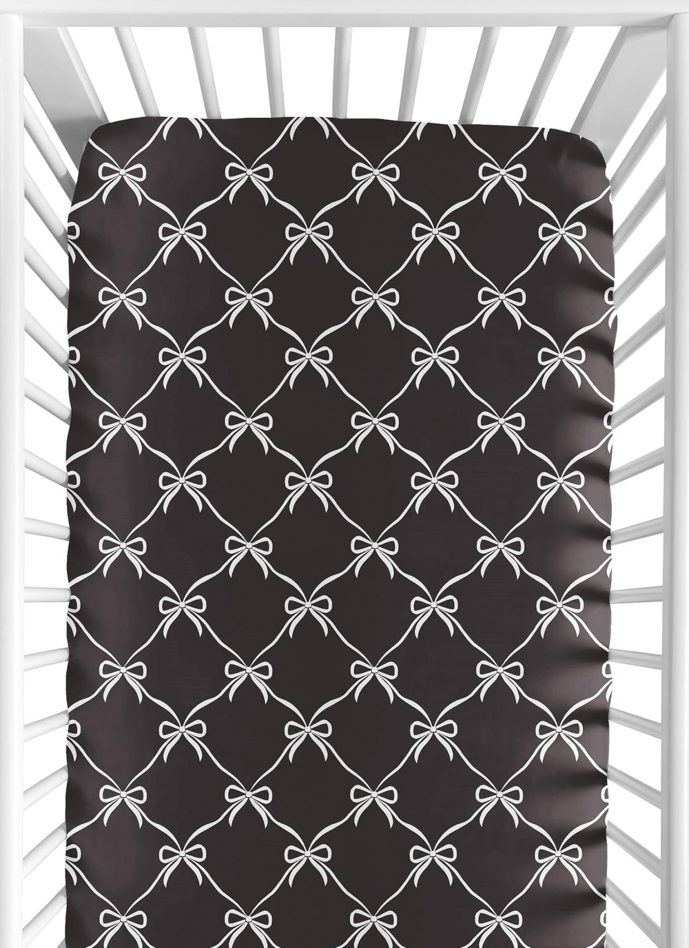 Sweet Jojo Designs fitted crib sheet with black and white bows creates a cozy sleep space.