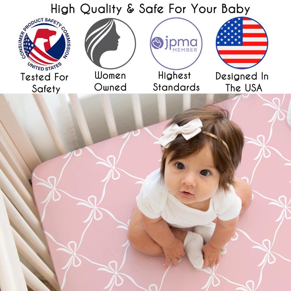 Sweet Jojo Designs fitted crib sheet with elastic edge for secure, snug fit.