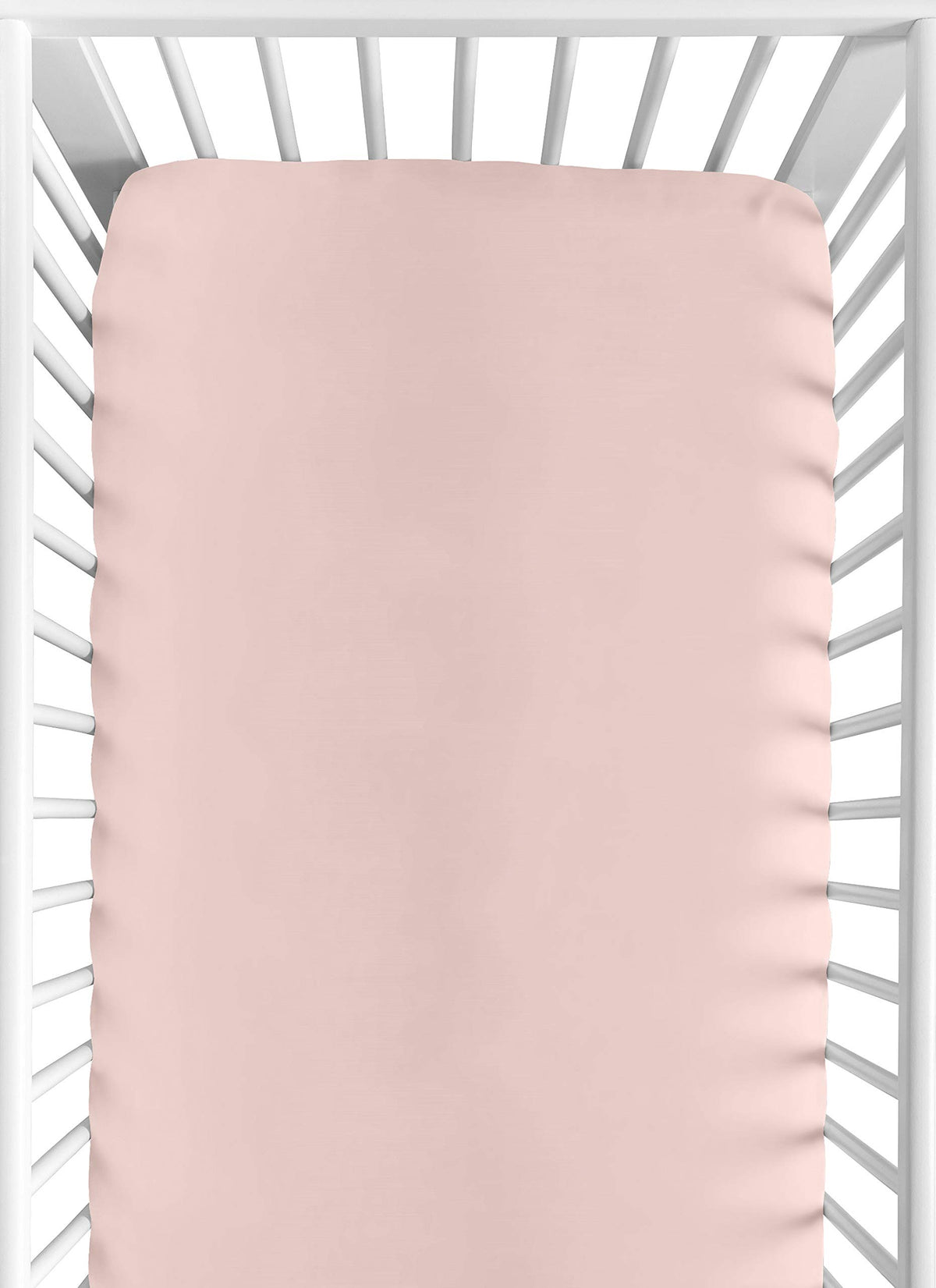 Sweet Jojo Designs fitted crib sheet in solid pink for a cozy newborn sleep.