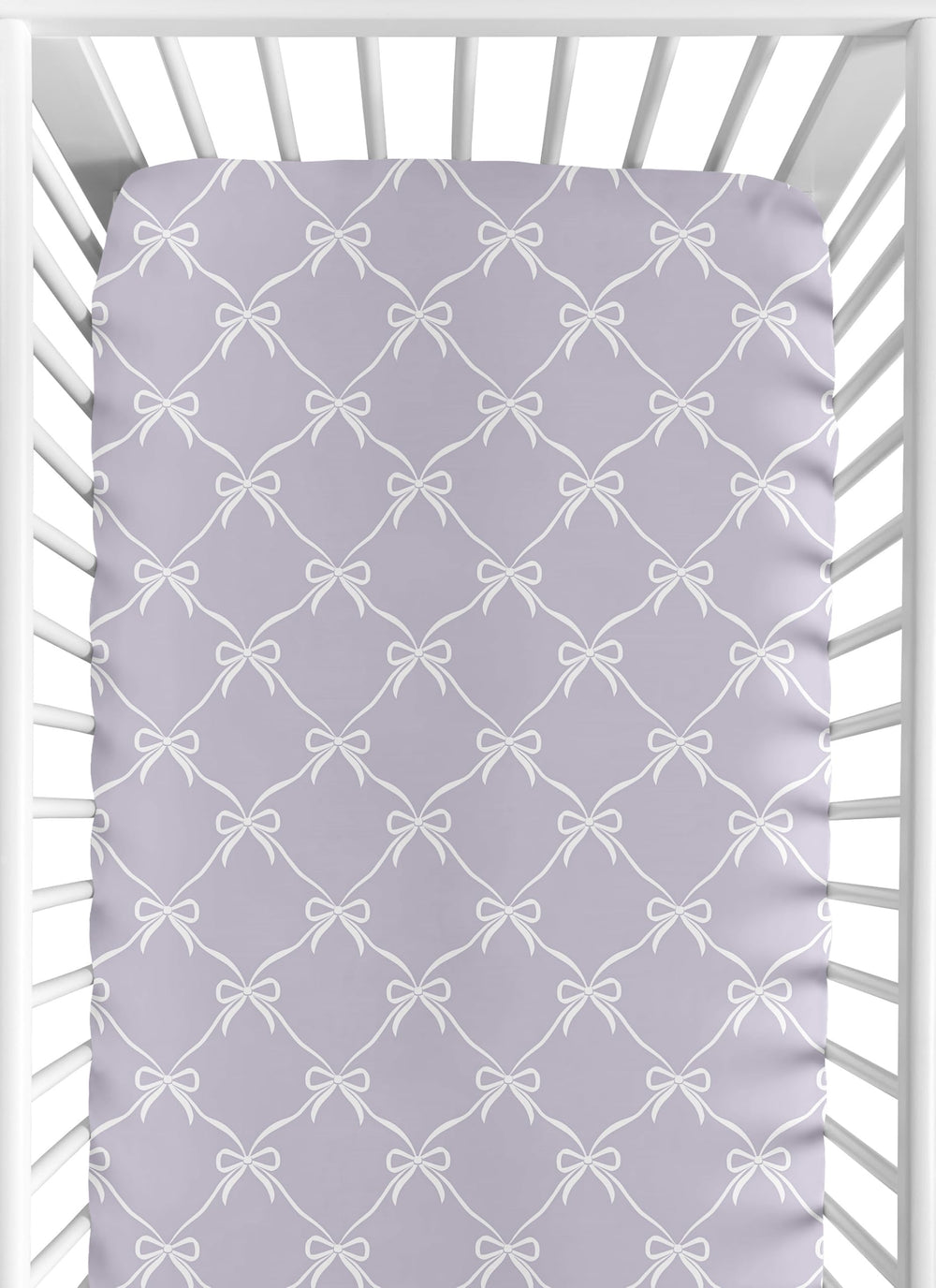 Sweet Jojo Designs fitted crib sheet in white and purple bows for a cozy nursery