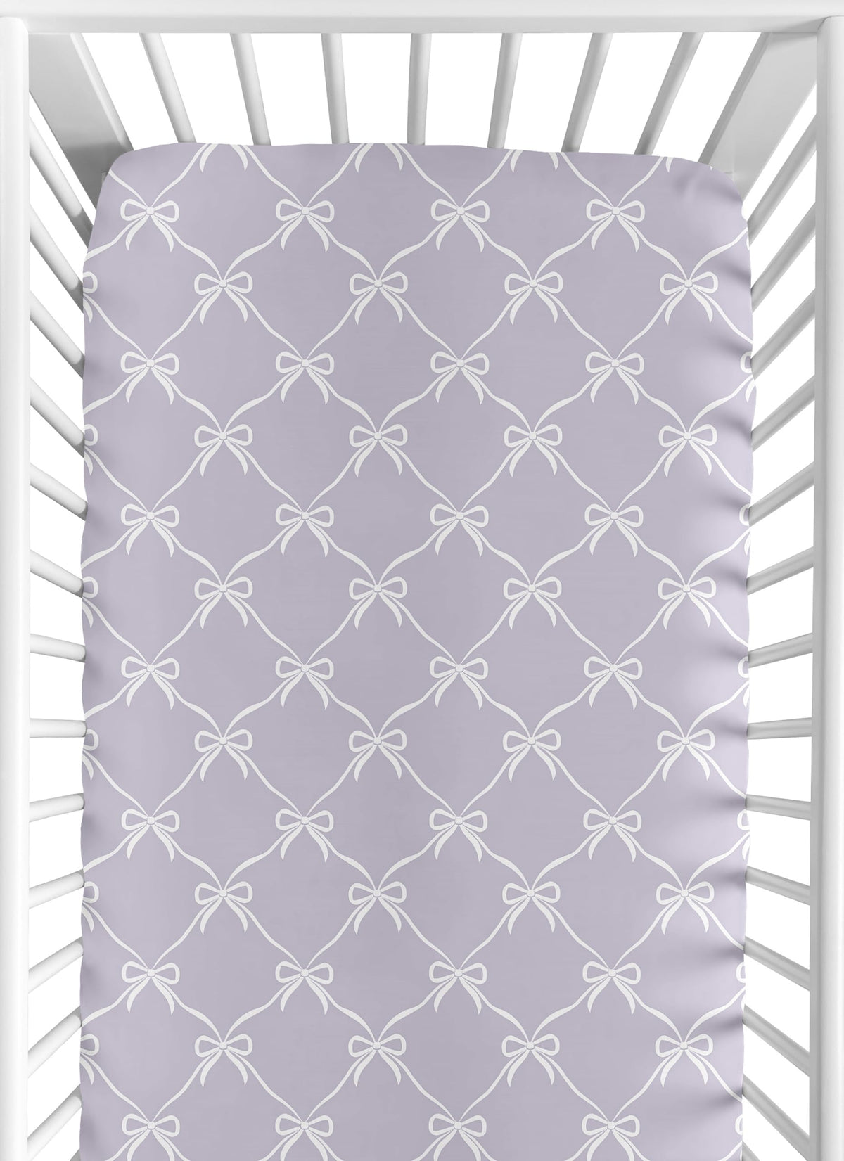 Sweet Jojo Designs fitted crib sheet in white and purple bows for a cozy nursery