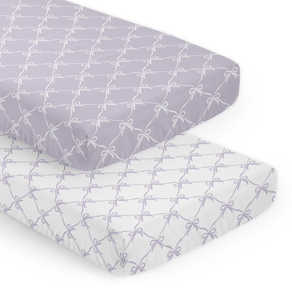 Sweet Jojo Designs lavender bows crib sheet – front view shows snug fit.
