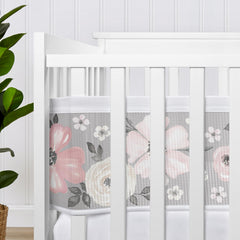 Mesh liner taut sides shown installed on a standard crib.