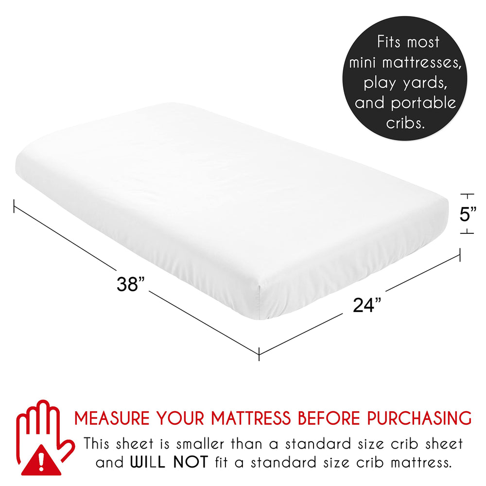 Sweet Jojo Designs mini crib sheet with elastic edge for secure sleep.